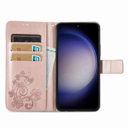 For Samsung Galaxy S23 FE 5G Four-leaf Clasp Embossed Buckle Leather Phone Case(Rose Gold)